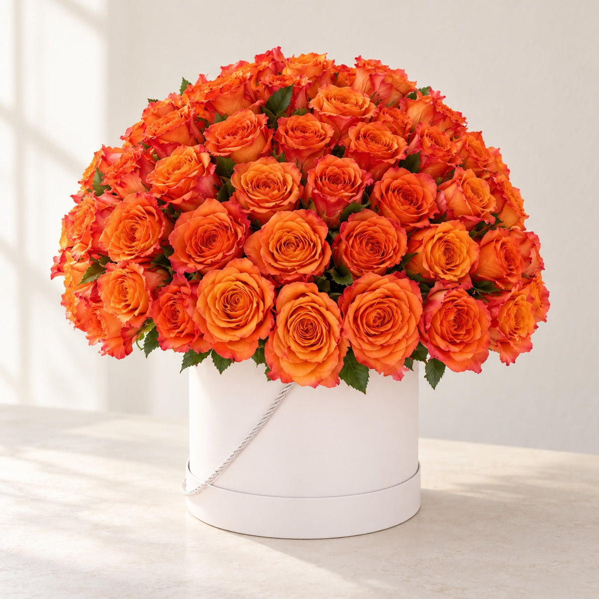 AI-assisted photo-style preview of 100 Luxe Rose Box, 100-rose option; actual arrangement and proportions vary.