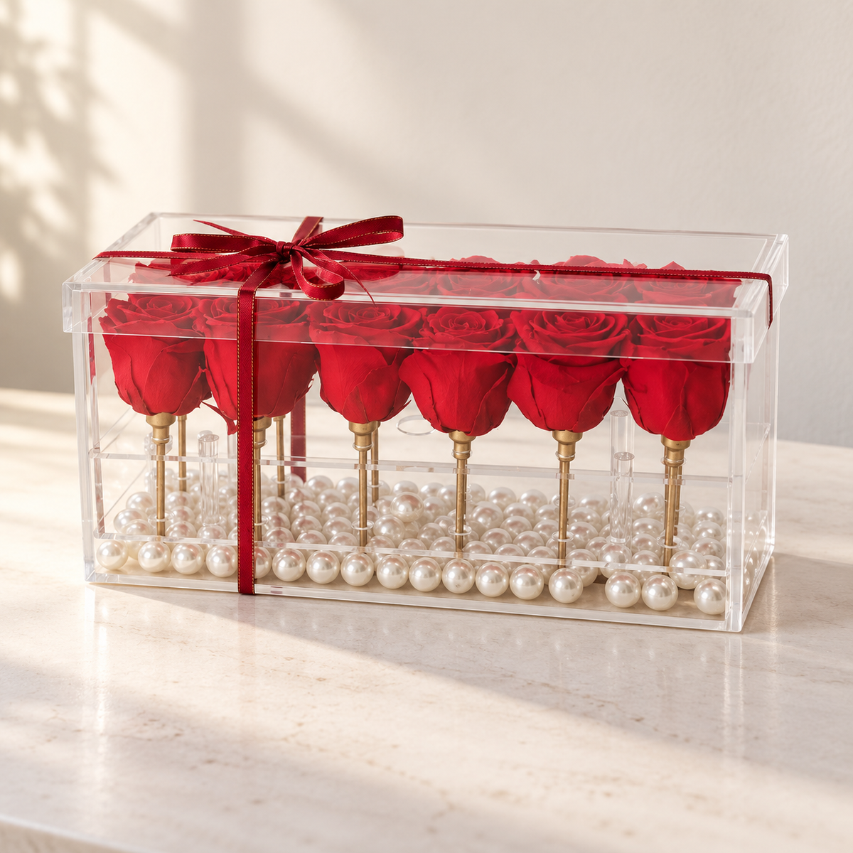 AI-assisted photo-style preview of 12 Red Rose Acrylic Rose Box as shown; actual arrangement and proportions vary.