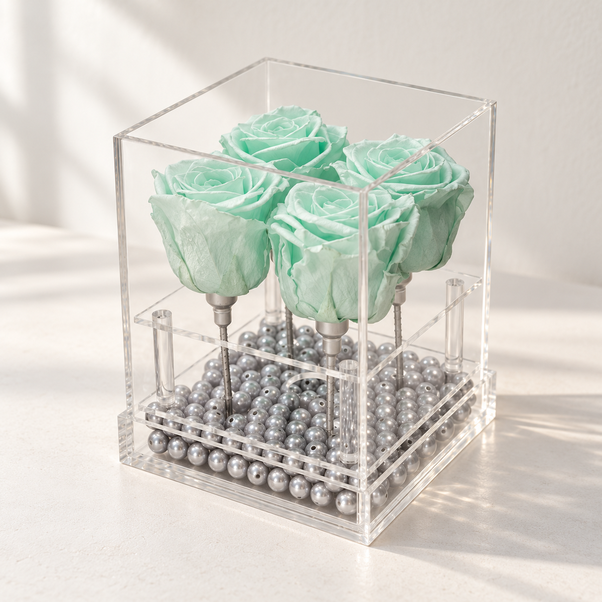 AI-assisted photo-style preview of 4 Rose 'Tiffany' Blue Rose Box as shown; actual arrangement and proportions vary.