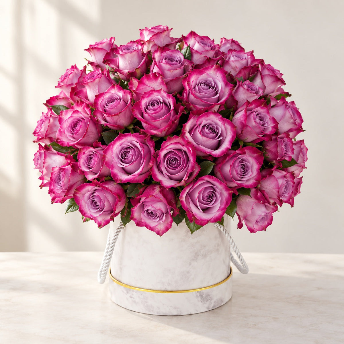 AI-assisted photo-style preview of 50 Rose Box, 50-rose option; actual arrangement and proportions vary.