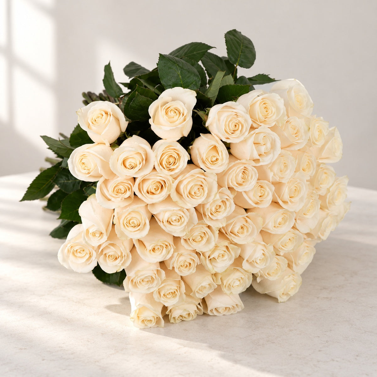 AI-assisted photo-style preview of 50 Vendela Ivory Roses | Toronto Flower Delivery as shown; actual arrangement and proportions vary.
