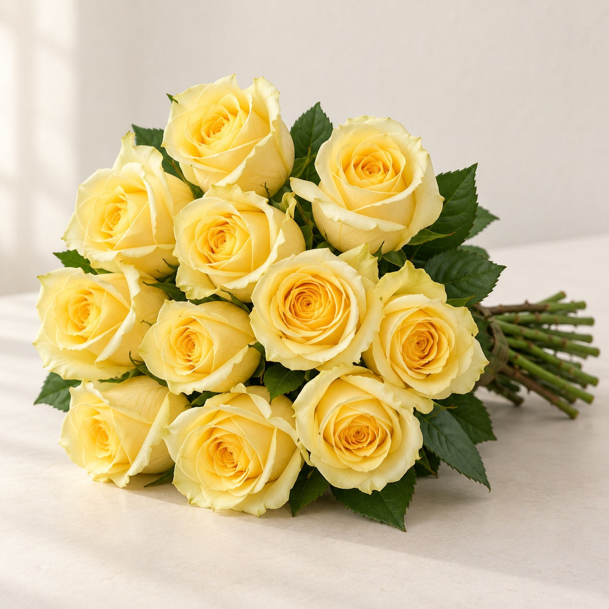 AI-assisted photo-style preview of 'Creme De La Creme' Cream Roses, 12-rose option; actual arrangement and proportions vary.