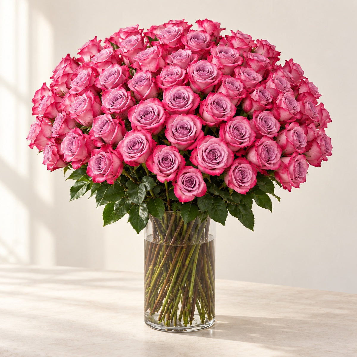 AI-assisted photo-style preview of 'Deep Purple' Long Stem Vase Arrangement, 75-rose option; actual arrangement and proportions vary.