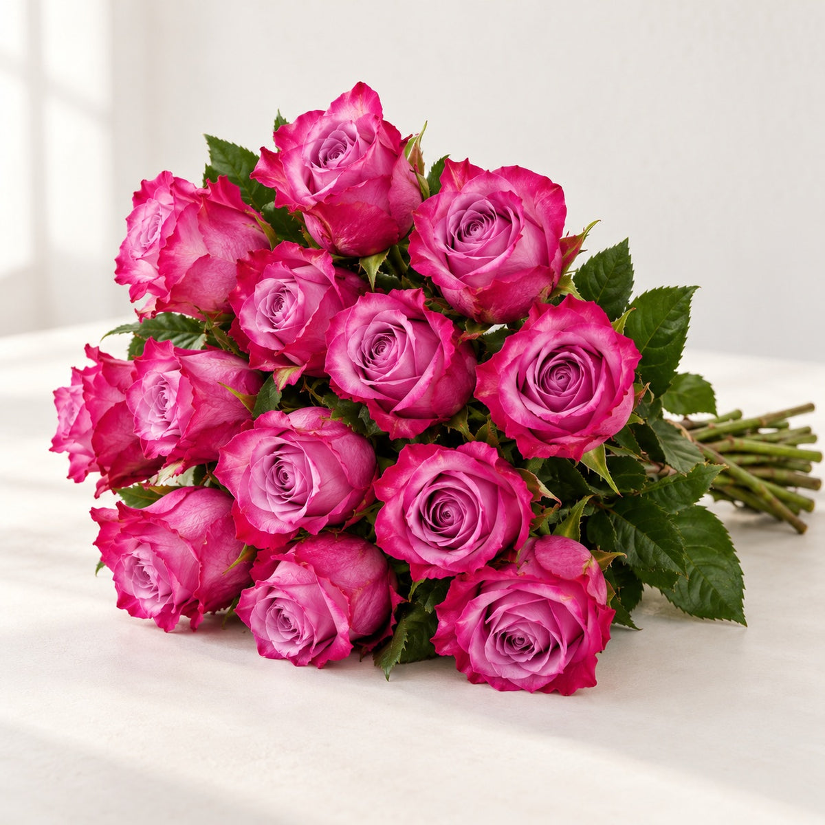 AI-assisted photo-style preview of 'Deep Purple' Two Tone Purple Roses, 12-rose option; actual arrangement and proportions vary.