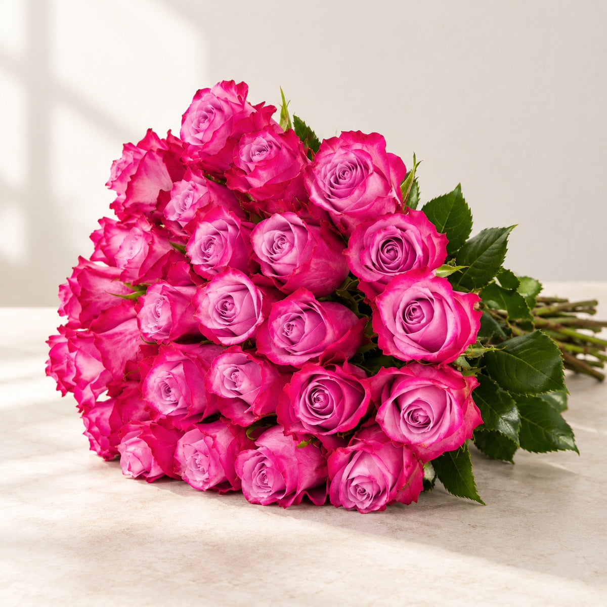 AI-assisted photo-style preview of 'Deep Purple' Two Tone Purple Roses, 25-rose option; actual arrangement and proportions vary.