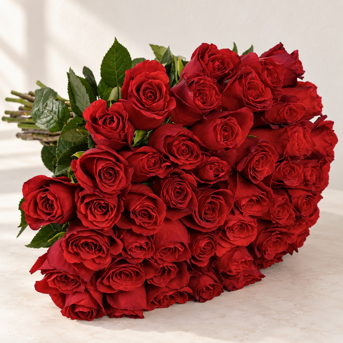 AI-assisted photo-style preview of 'Explorer' Signature Fifty Rose Bouquet as shown; actual arrangement and proportions vary.
