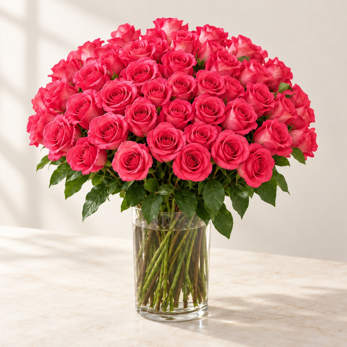 AI-assisted photo-style preview of 50 Pink Floyd Roses in a Glass Vase – Toronto Flower Delivery, 50-rose option; actual arrangement and proportions vary.
