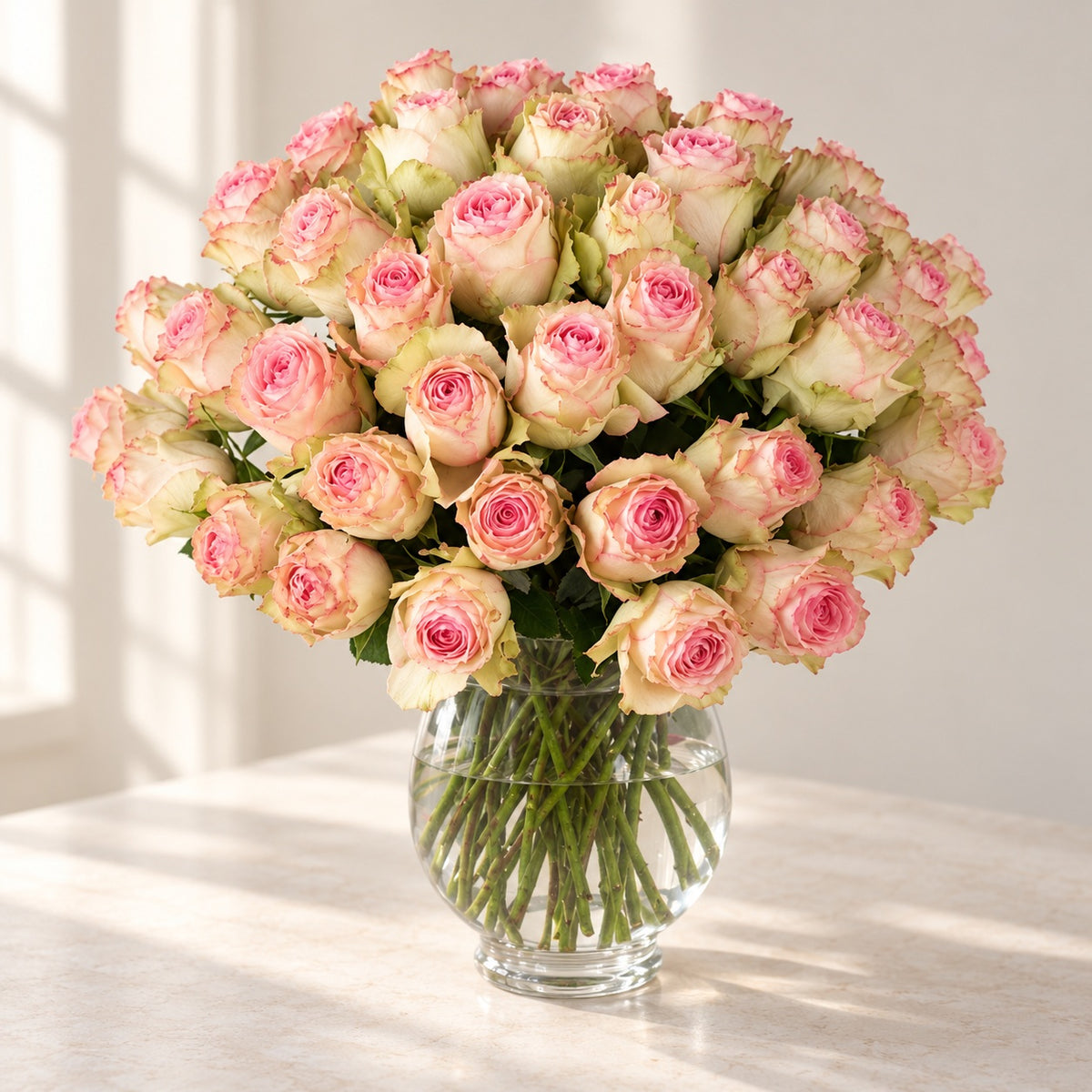 AI-assisted photo-style preview of Fifty Medium Stem 'Esperanza' Rose Vase Arrangement as shown; actual arrangement and proportions vary.