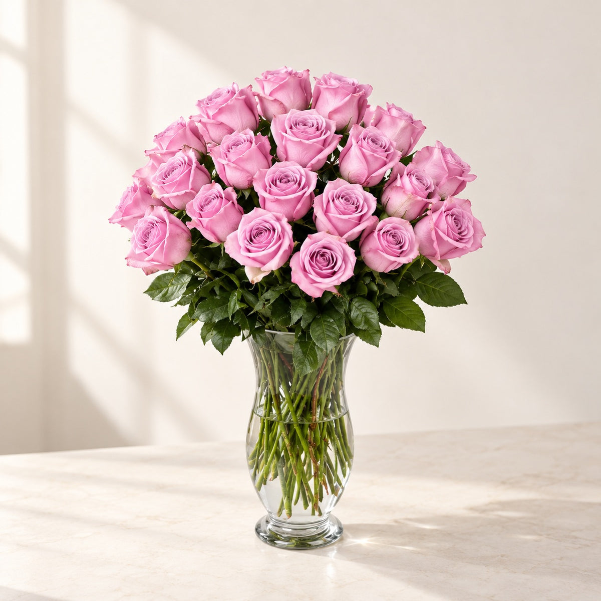 AI-assisted photo-style preview of 50 Nautica Lavender Roses in a Glass Vase – Toronto Delivery, 25-rose option; actual arrangement and proportions vary.