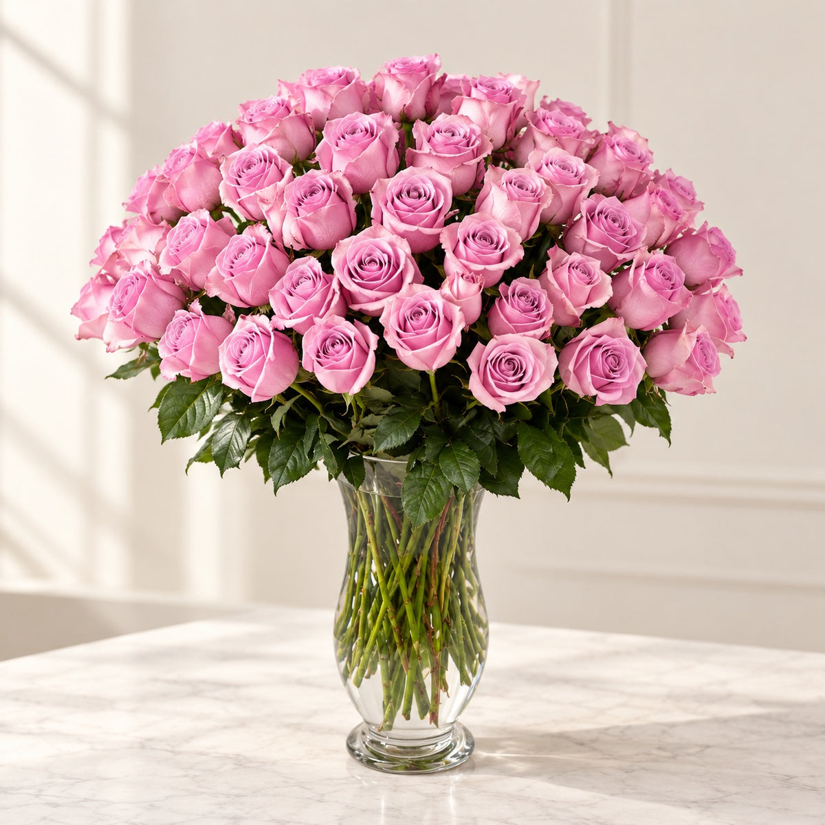 AI-assisted photo-style preview of 50 Nautica Lavender Roses in a Glass Vase – Toronto Delivery, 50-rose option; actual arrangement and proportions vary.