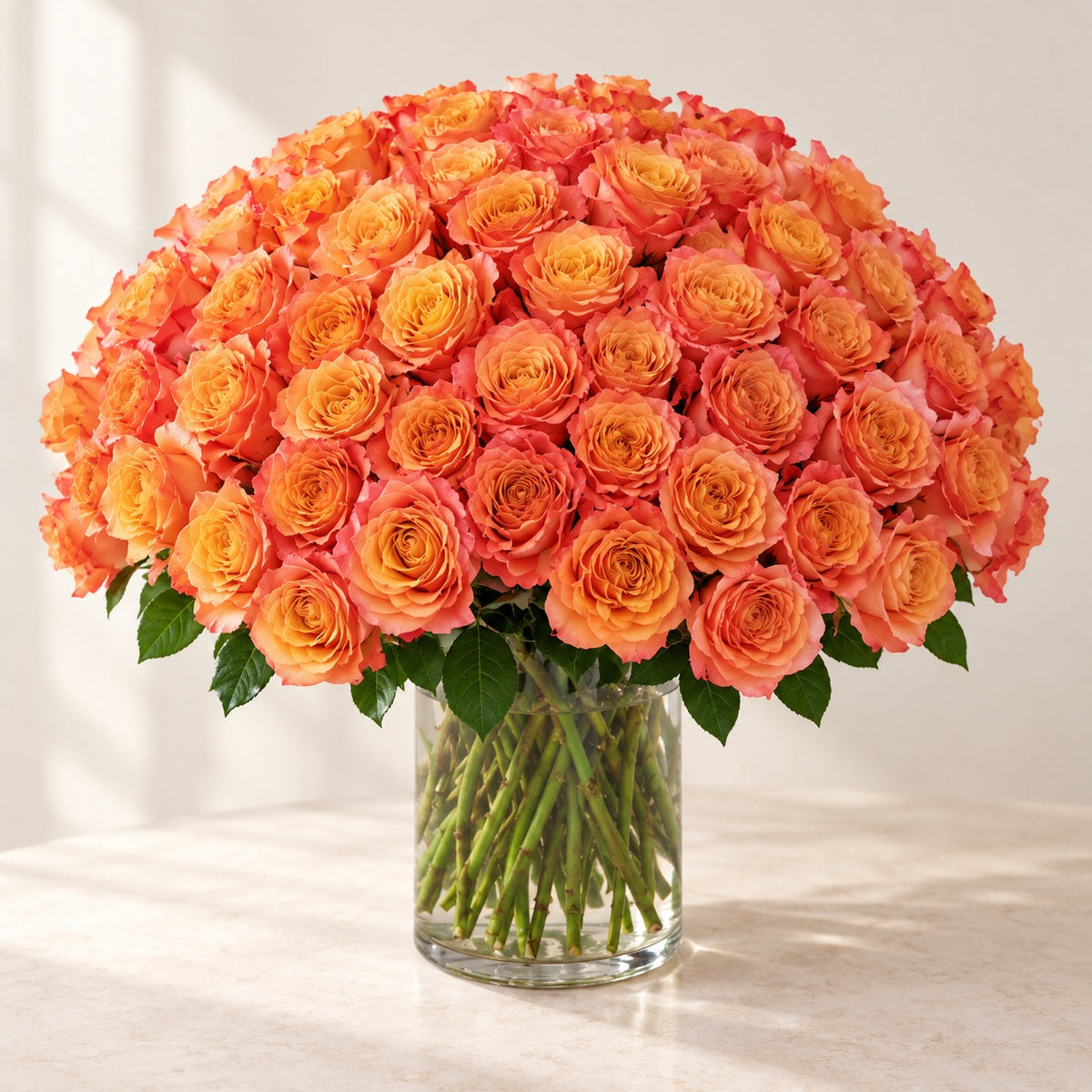 AI-assisted photo-style preview of Free Spirit Roses in a Glass Vase – Toronto Flower Delivery, 100-rose option; actual arrangement and proportions vary.