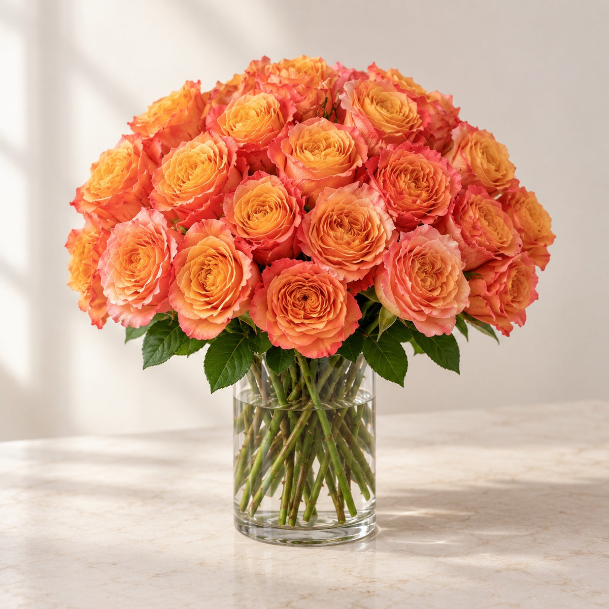 AI-assisted photo-style preview of Free Spirit Roses in a Glass Vase – Toronto Flower Delivery, 25-rose option; actual arrangement and proportions vary.