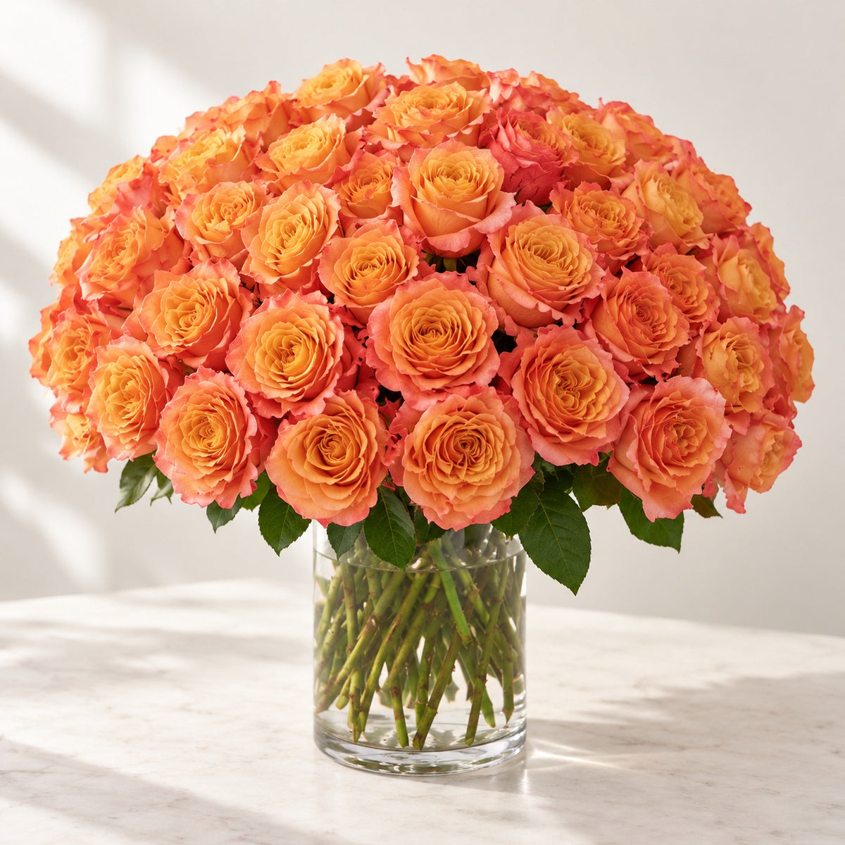 AI-assisted photo-style preview of Free Spirit Roses in a Glass Vase – Toronto Flower Delivery, 50-rose option; actual arrangement and proportions vary.