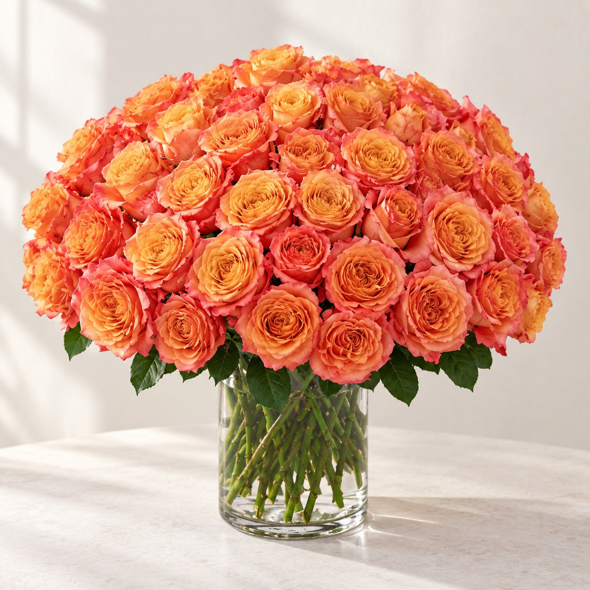 AI-assisted photo-style preview of Free Spirit Roses in a Glass Vase – Toronto Flower Delivery, 75-rose option; actual arrangement and proportions vary.