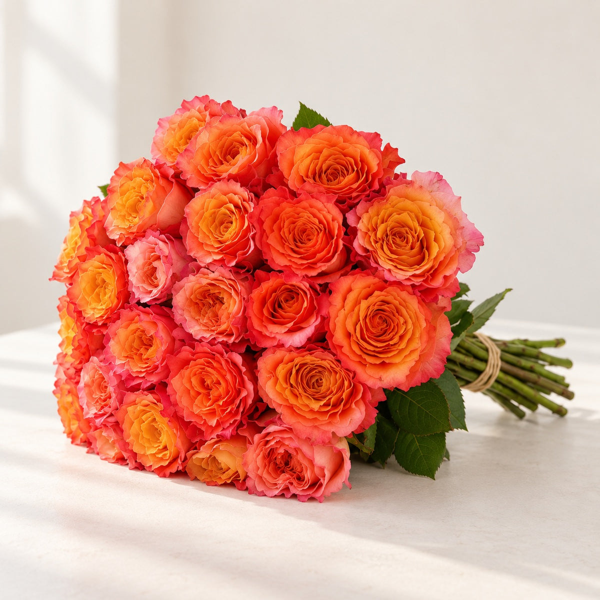 AI-assisted photo-style preview of 'Free-Spirit' Orange Garden Roses, 25-rose option; actual arrangement and proportions vary.