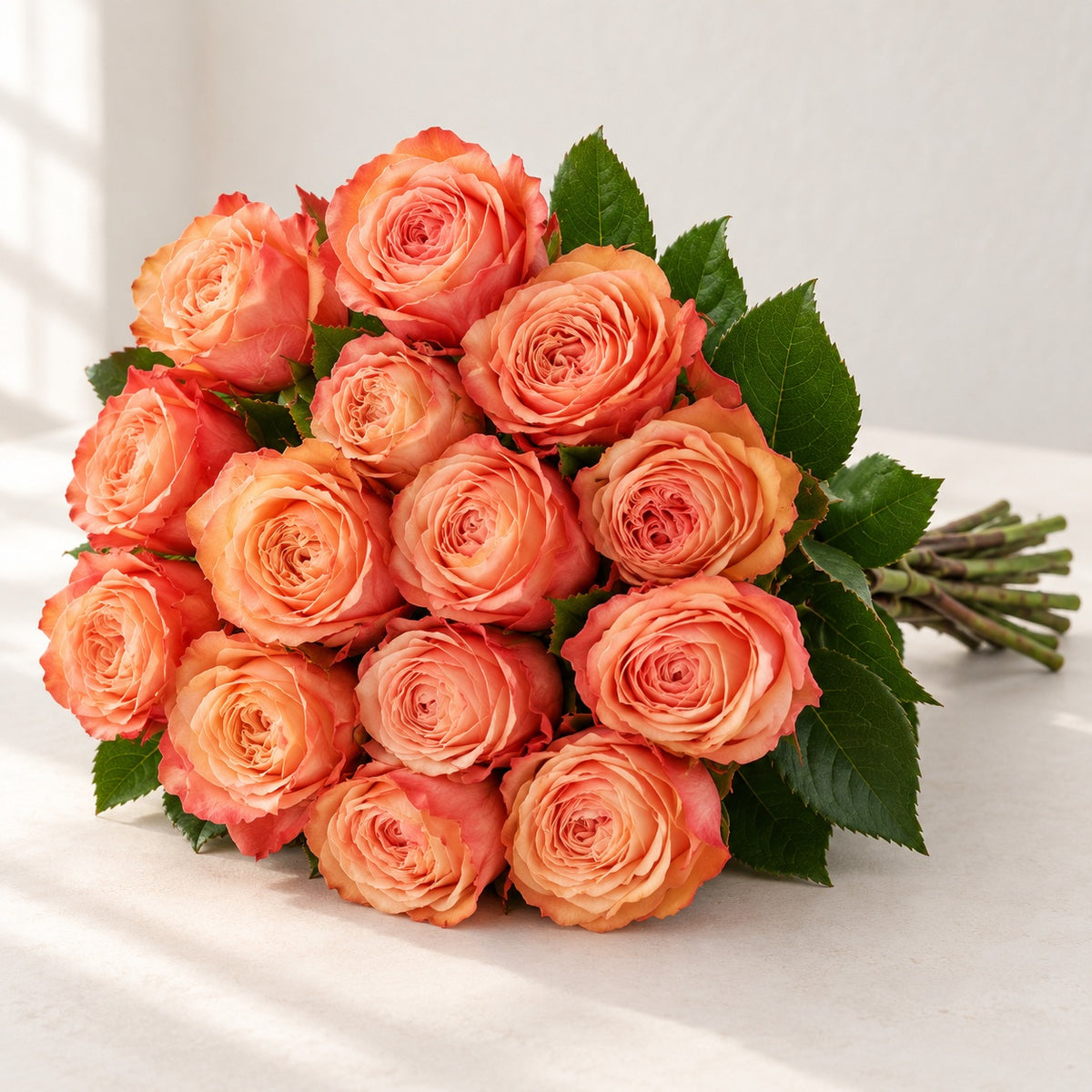 AI-assisted photo-style preview of 'Kahala' Peach Roses, 12-rose option; actual arrangement and proportions vary.