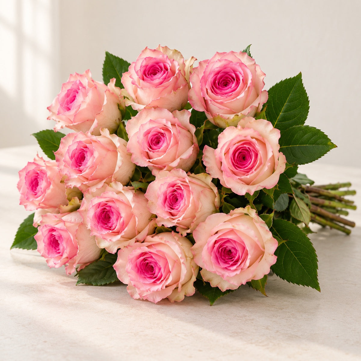 AI-assisted photo-style preview of 'Mandala' Soft Pink Roses, 12-rose option; actual arrangement and proportions vary.