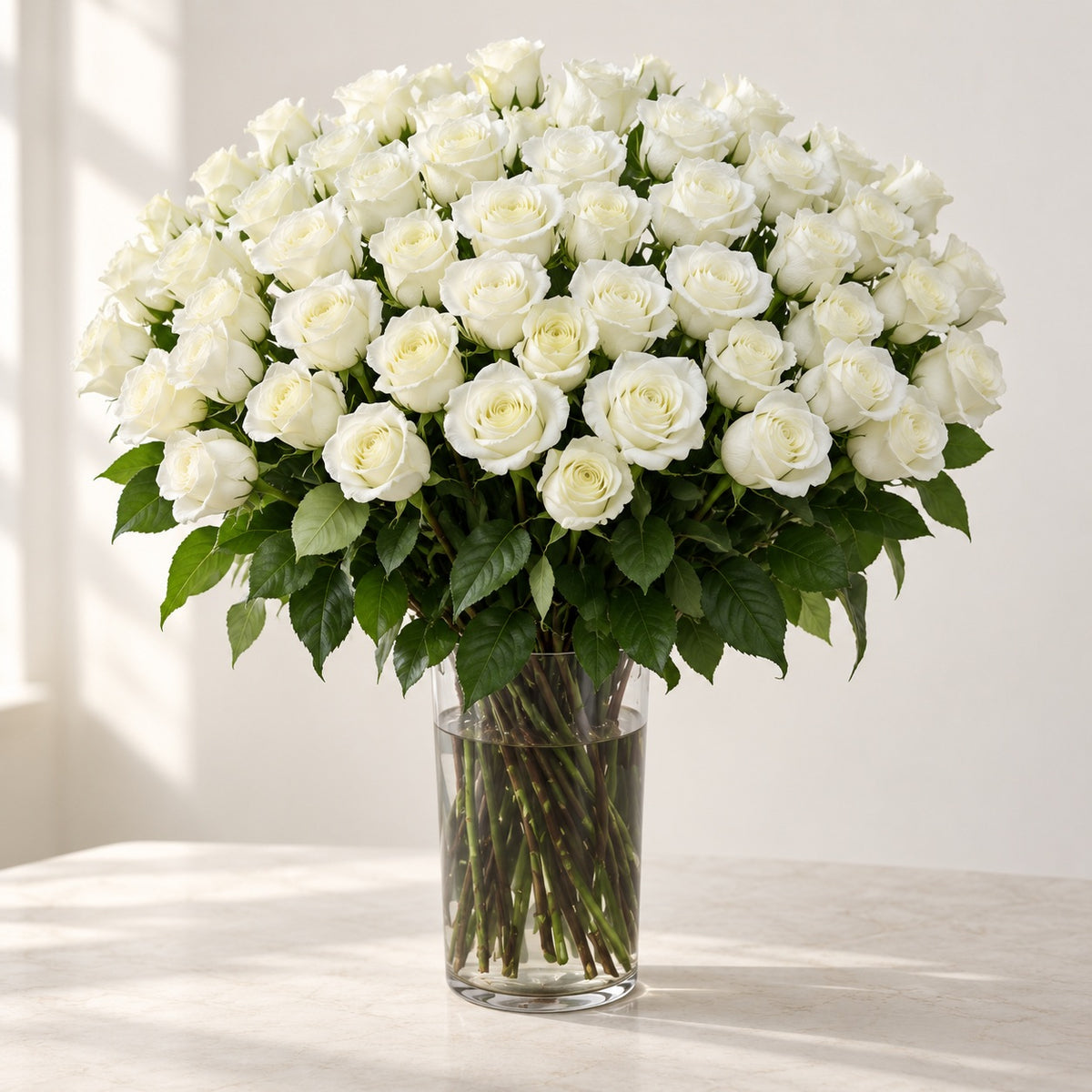 AI-assisted photo-style preview of 'MIA' XLong Stem Vase Arrangement, 75-rose option; actual arrangement and proportions vary.