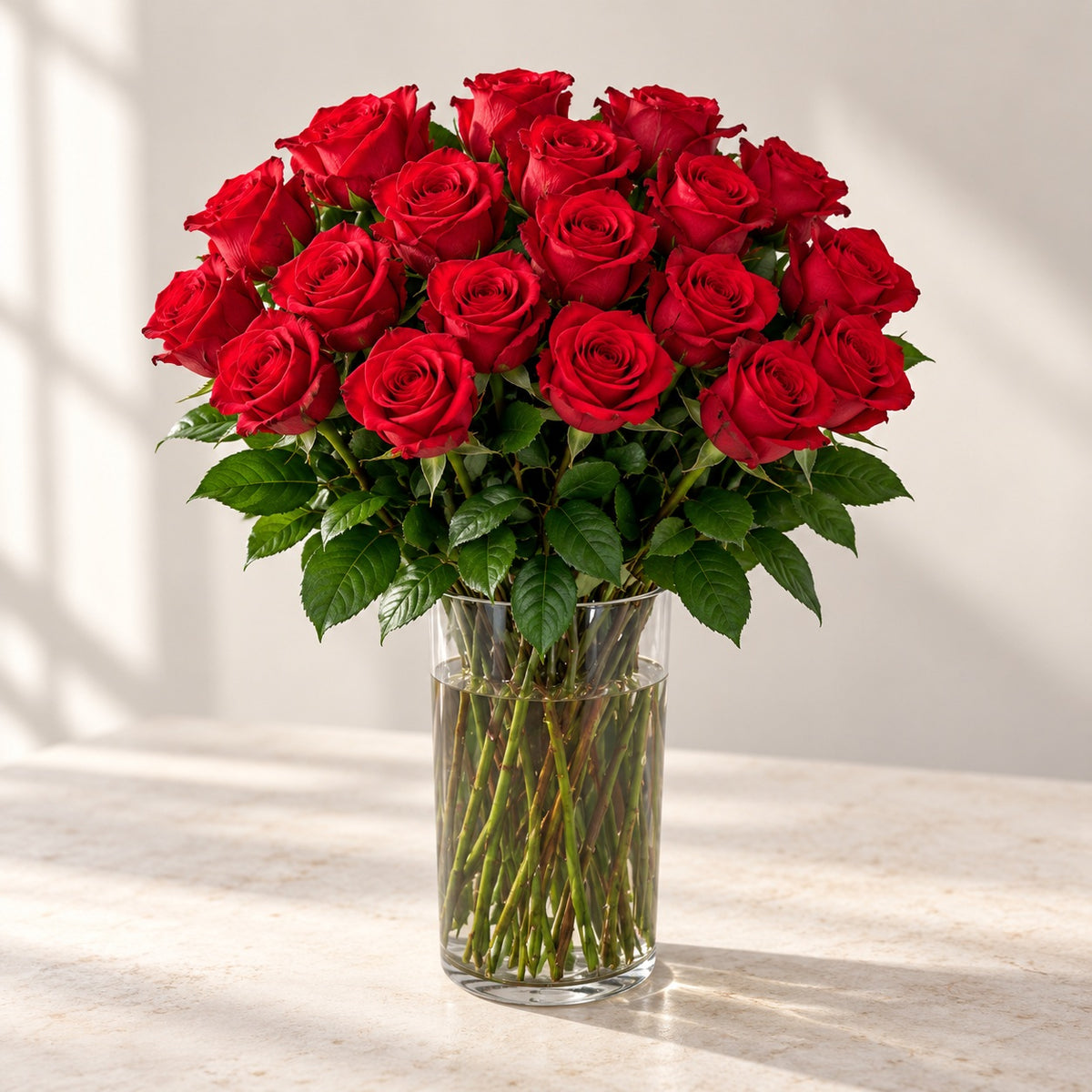 AI-assisted photo-style preview of 'Nina' XLong Stem Vase Arrangement, 25-rose option; actual arrangement and proportions vary.
