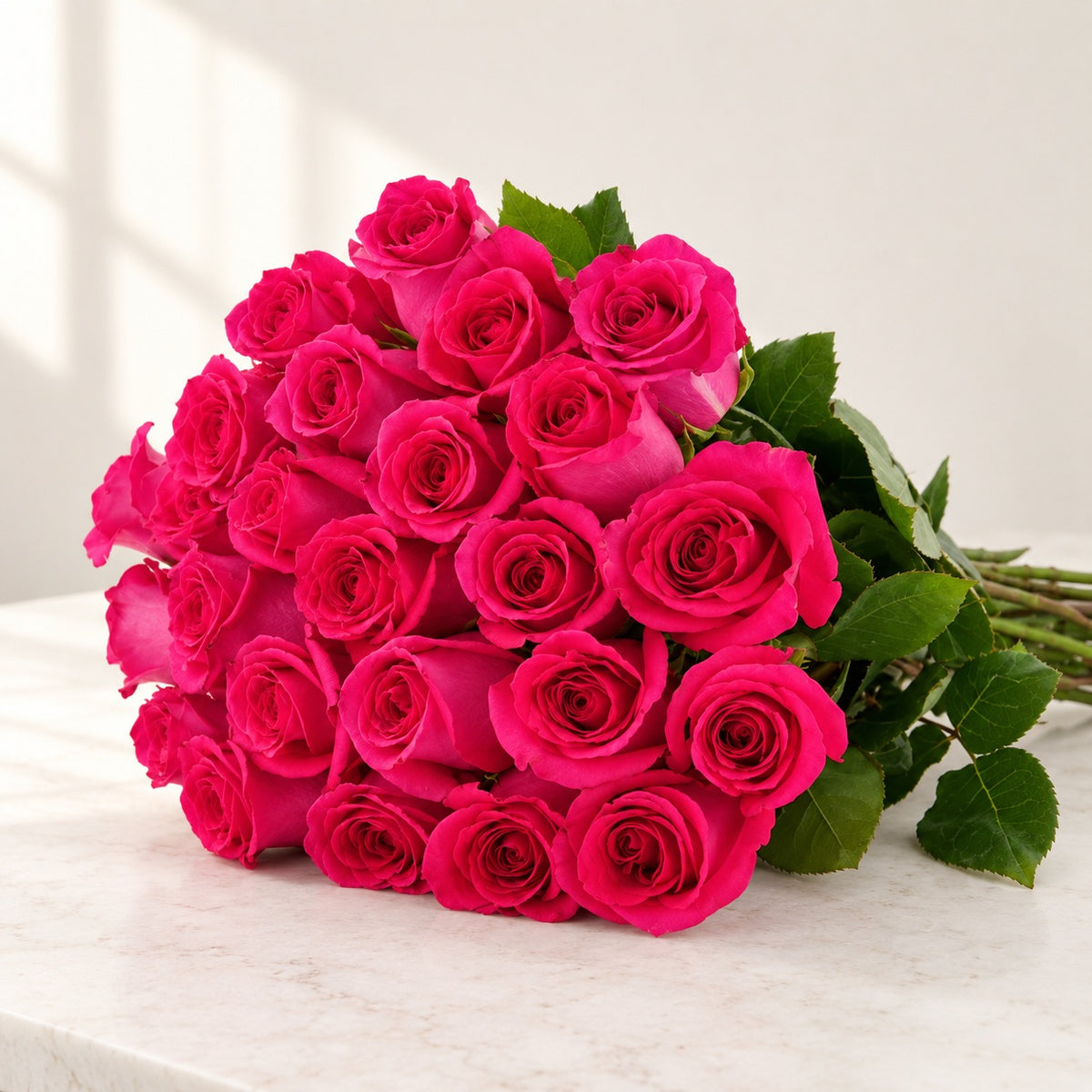 AI-assisted photo-style preview of 'Pink Floyd' Fuschia Roses, 24-rose option; actual arrangement and proportions vary.