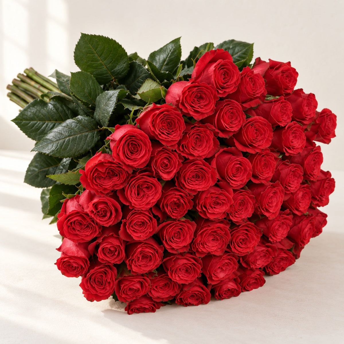 AI-assisted photo-style preview of 'Pink Mondial' Signature Fifty Rose Bouquet, 50-rose option; actual arrangement and proportions vary.