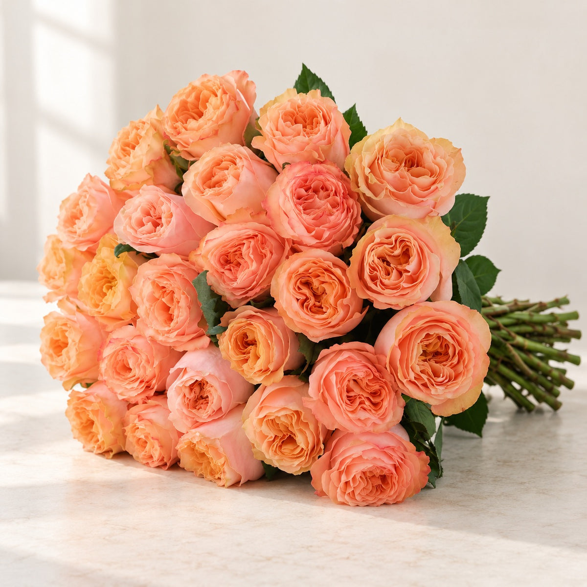 AI-assisted photo-style preview of 'Princess-Crown' Peach Garden Roses, 25-rose option; actual arrangement and proportions vary.