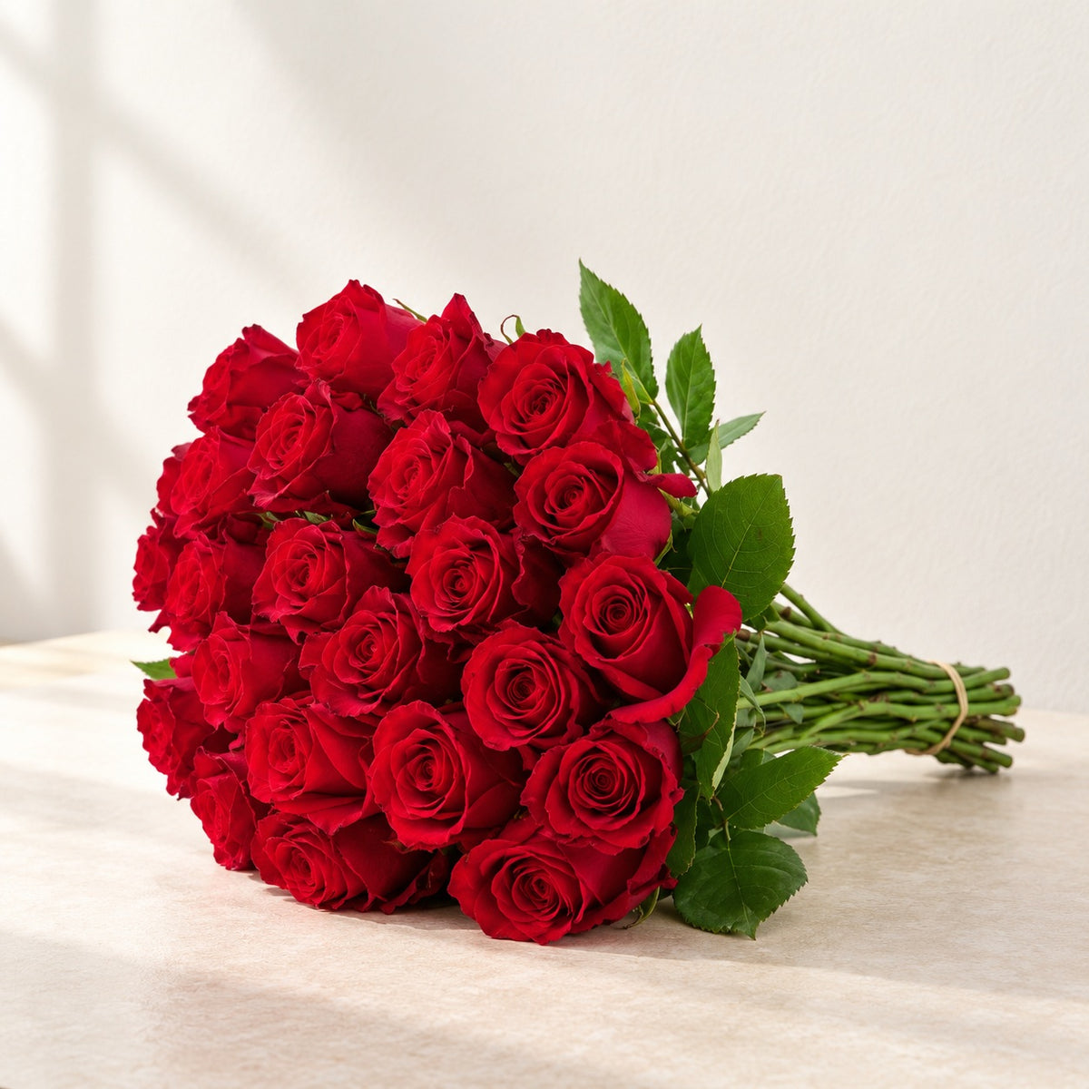AI-assisted photo-style preview of 'Sexy Red' Roses, 25-rose option; actual arrangement and proportions vary.