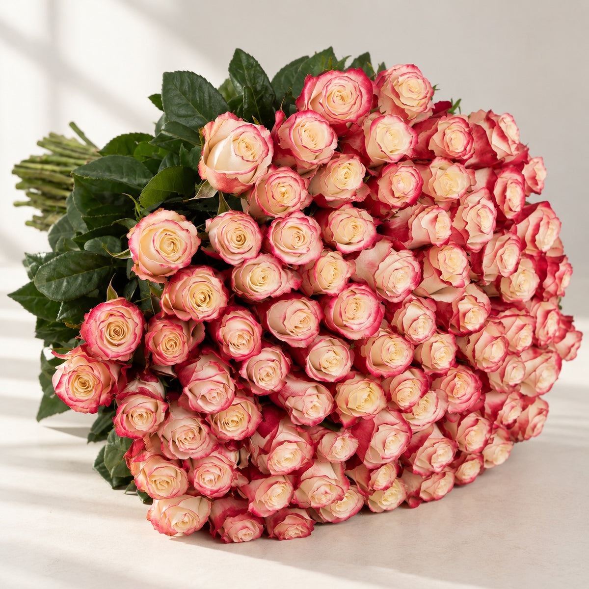 AI-assisted photo-style preview of 'Sweetness' Signature 101 Rose Bouquet as shown; actual arrangement and proportions vary.