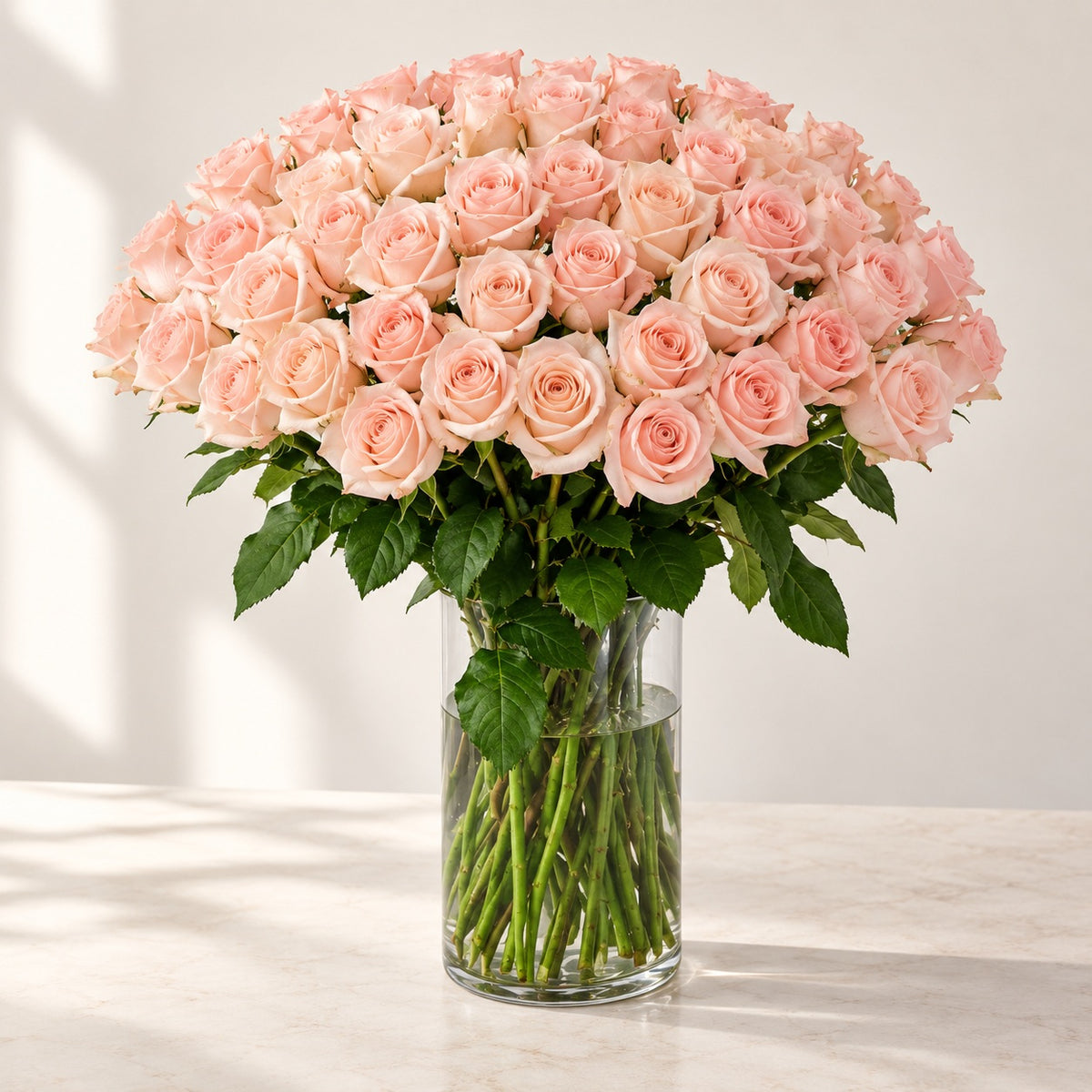 AI-assisted photo-style preview of 'Tiffany' Long Stem Vase Arrangement, 50-rose option; actual arrangement and proportions vary.